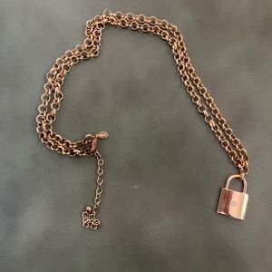 Chico gold locket necklace, clear stone, 17” long with 4” extender, used.